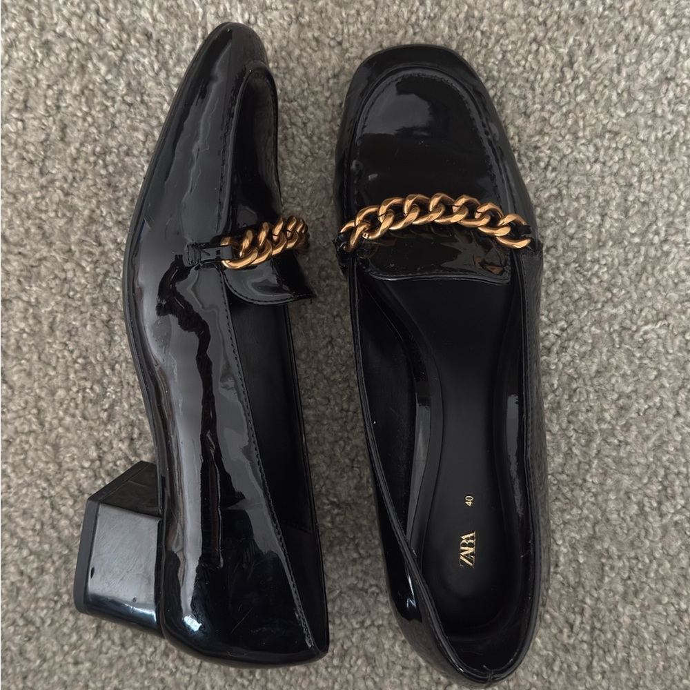 Zara Glossy Black Loafers with Gold Chain Accent